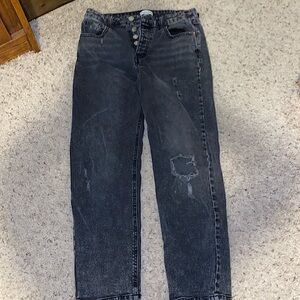 Black distressed jeans.